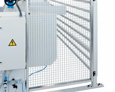 Safety cage with optional light barrier, cutting process stops immediately if barrier is broken